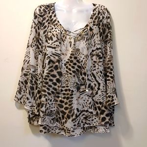 Jennifer Lopez animal print blouse